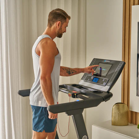 Man riding an Echelon fitness bike